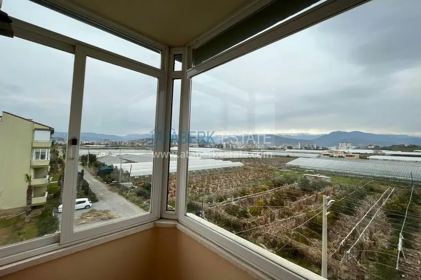 Приобрести Просторная четырехкомнатная квартира с 3 спальнями и открытым видом на горы в Газипаше 9 