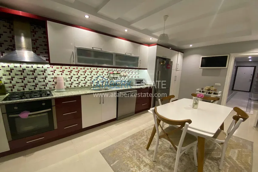 Приобрести Четырехкомнатная квартира с мебелью в Алании - район Тосмур 8 