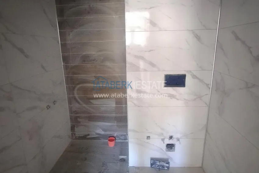 Приобрести Двухкомнатная квартира в комплексе на завершающем этапе строительства в Газипаше 10 