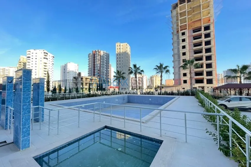 Апартаменты 3+1 с видом на море и горе в районе Тедже-Мерсин 2 