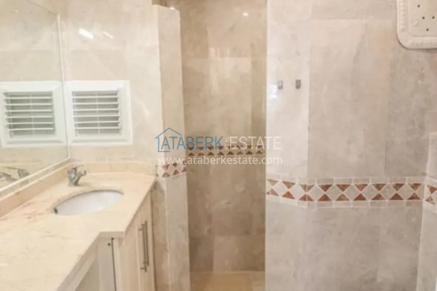 Приобрести Меблированный дуплекс в Авсалларе с видом на море в уютном жилом комплексе 10 