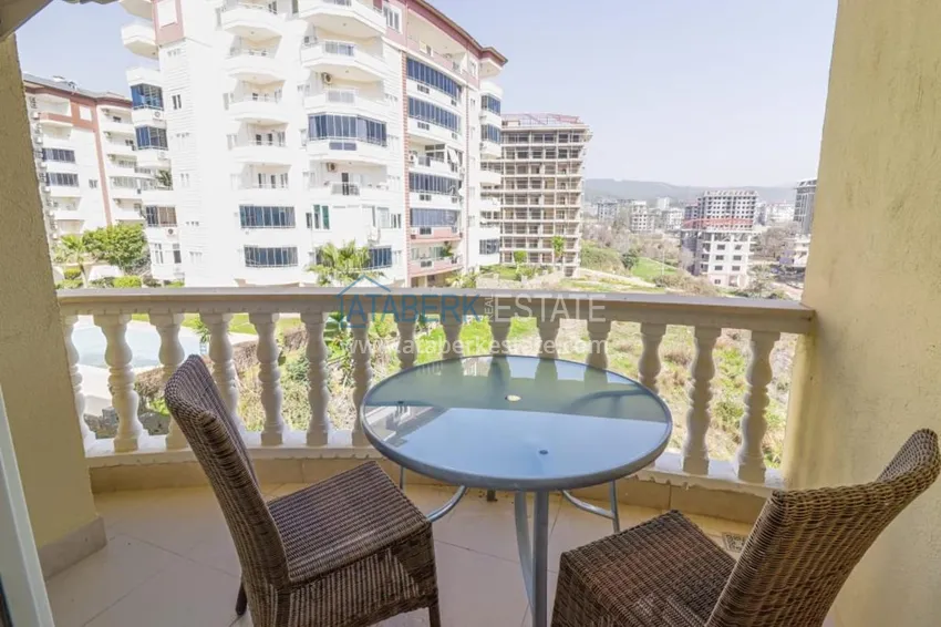 Приобрести Меблированный дуплекс в Авсалларе с видом на море в уютном жилом комплексе 14 