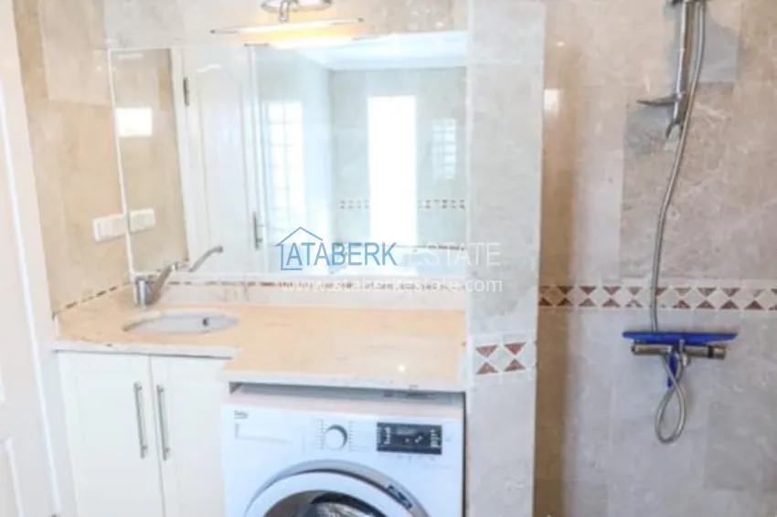 Приобрести Меблированный дуплекс в Авсалларе с видом на море в уютном жилом комплексе 19 