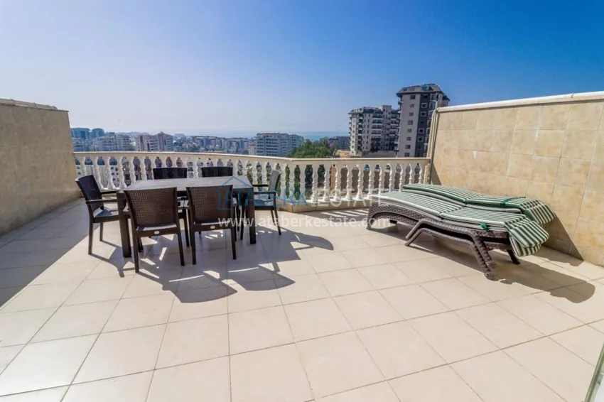 Приобрести Меблированный дуплекс в Авсалларе с видом на море в уютном жилом комплексе 21 