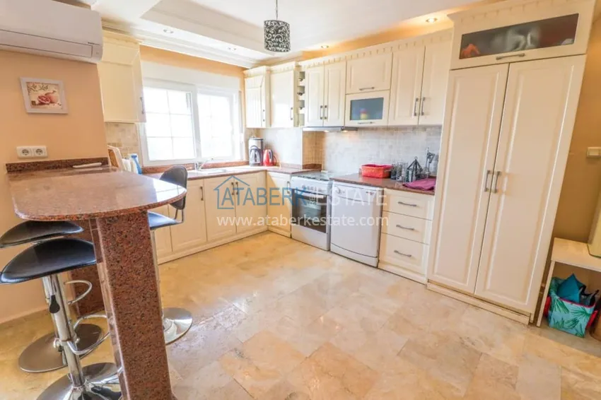 Приобрести Меблированный дуплекс в Авсалларе с видом на море в уютном жилом комплексе 6 