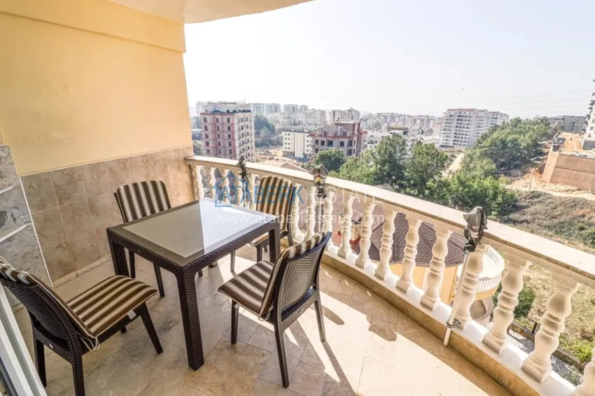 Приобрести Меблированный дуплекс в Авсалларе с видом на море в уютном жилом комплексе 7 