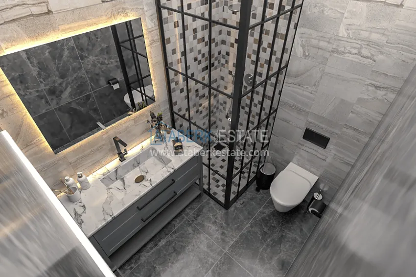 Приобрести Квартиры с открытым видом на море на стадии строительства в районе Аяш-Мерсин 12 