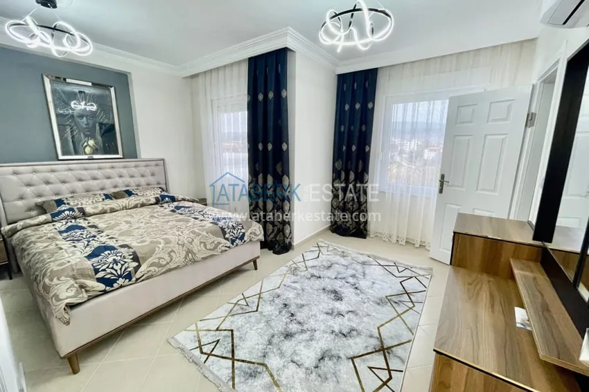 Приобрести Дуплекс 3+1 с мебелью и видом на горы в районе Алания открытом для ВНЖ - Акдам  10 