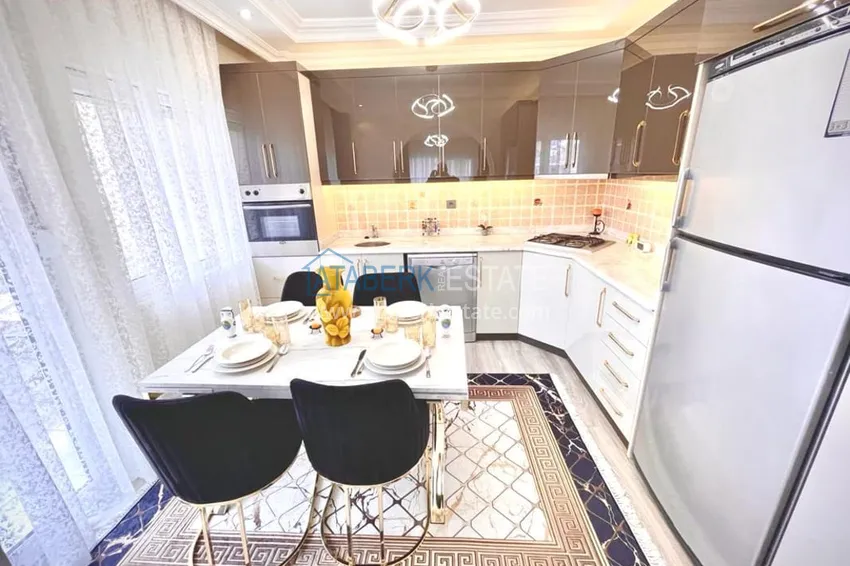 Приобрести Двухэтажные меблированные апартаменты с четырьмя спальнями в районе Оба 8 