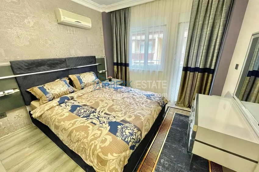 Приобрести Двухэтажные меблированные апартаменты с четырьмя спальнями в районе Оба 10 