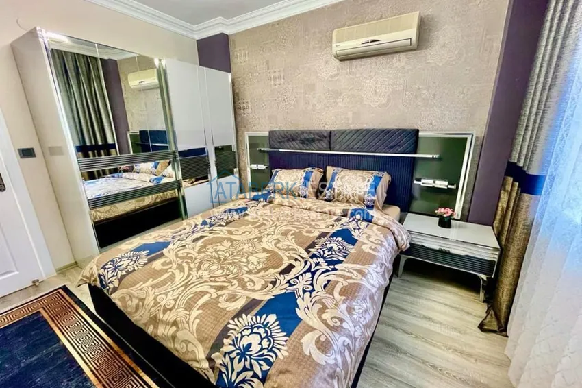 Приобрести Двухэтажные меблированные апартаменты с четырьмя спальнями в районе Оба 11 