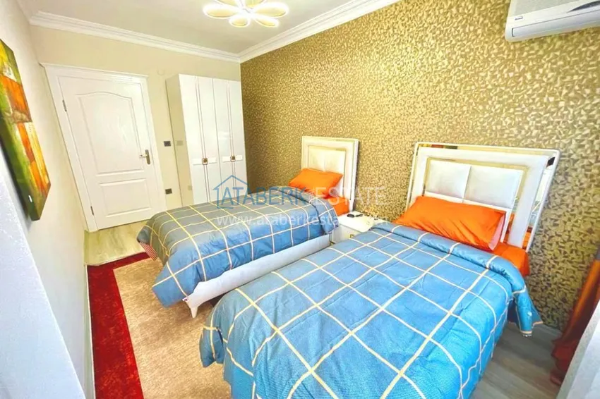 Приобрести Двухэтажные меблированные апартаменты с четырьмя спальнями в районе Оба 14 