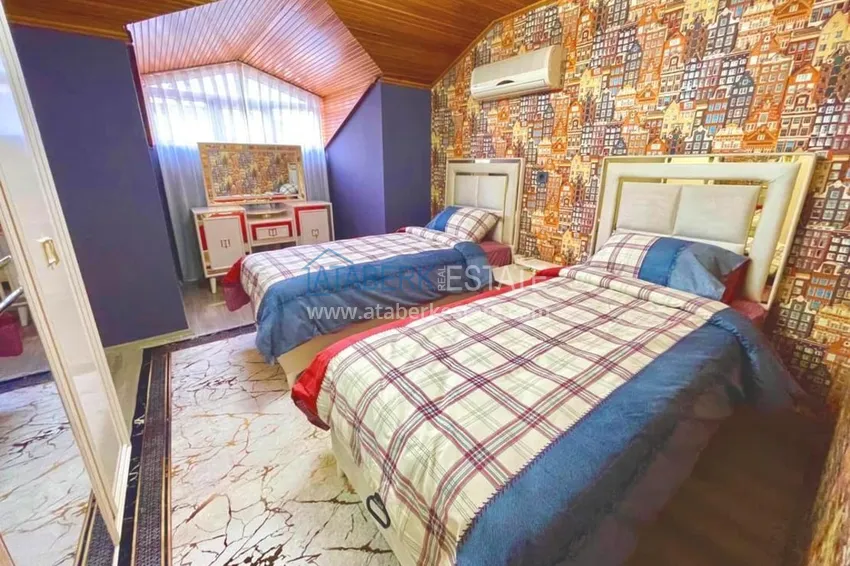 Приобрести Двухэтажные меблированные апартаменты с четырьмя спальнями в районе Оба 15 