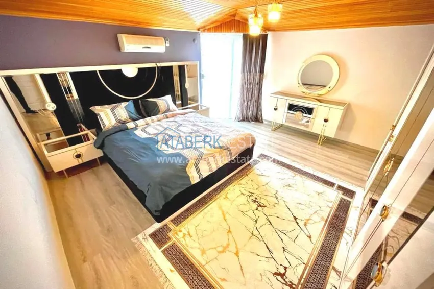 Приобрести Двухэтажные меблированные апартаменты с четырьмя спальнями в районе Оба 19 