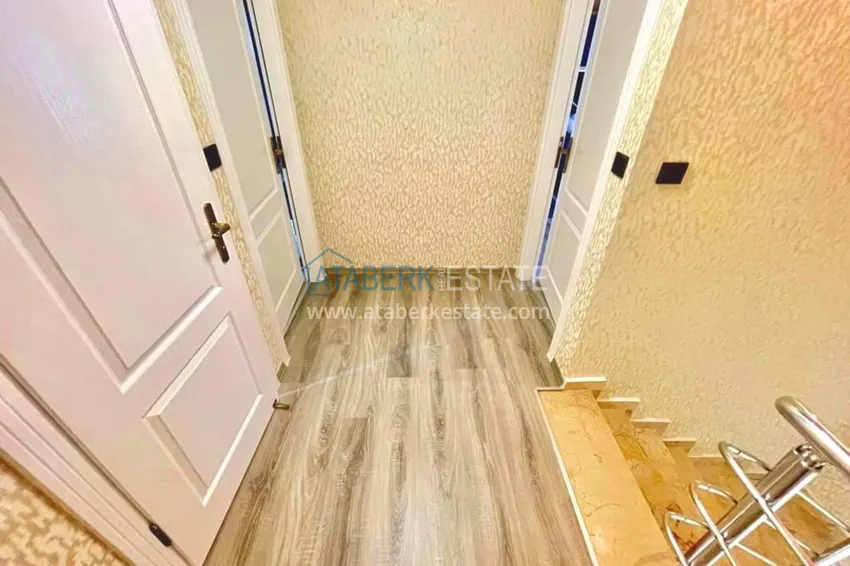 Приобрести Двухэтажные меблированные апартаменты с четырьмя спальнями в районе Оба 20 