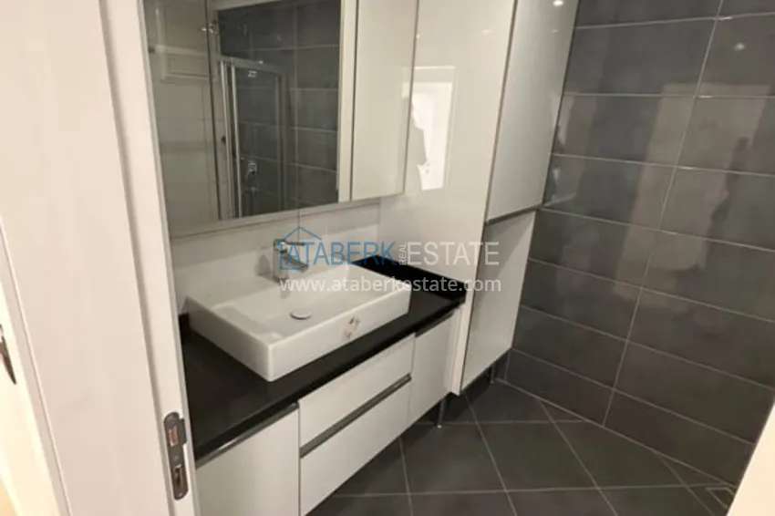 Приобрести Линейная квартира 4+1 в центре Алании с отдельной кухней, видом на море  24 