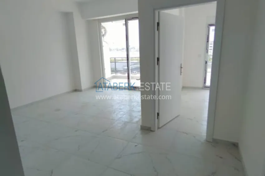 Приобрести Двухкомнатная квартира от собственника в новостройке Алания, район Авсаллар. Подходит для краткосрочной аренды 1 