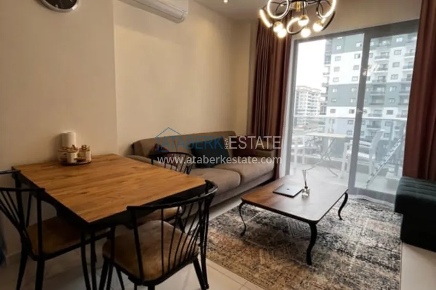 Приобрести Квартира 1+1 с мебелью в комплексе с инфраструктурой, район Махмутлар – Алания 1 