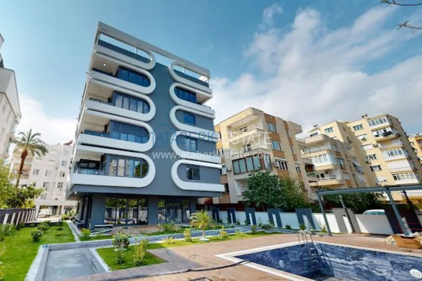 Квартиры с качественной чистовой отделкой от застройщика в Анталии район Лара  1 