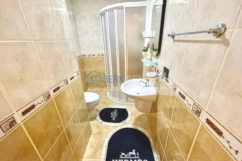 Приобрести Двухэтажные меблированные апартаменты с четырьмя спальнями в районе Оба 22 