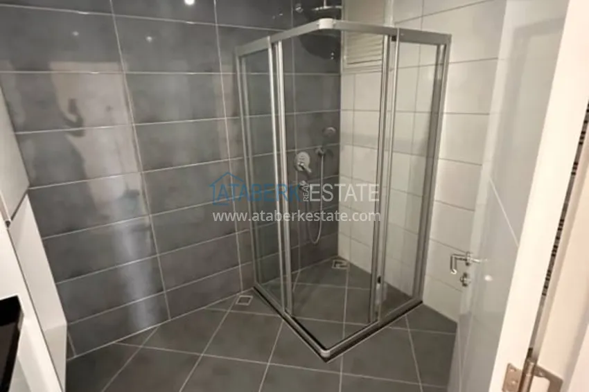 Приобрести Линейная квартира 4+1 в центре Алании с отдельной кухней, видом на море  26 