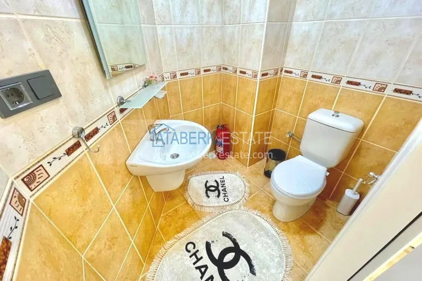 Приобрести Двухэтажные меблированные апартаменты с четырьмя спальнями в районе Оба 23 