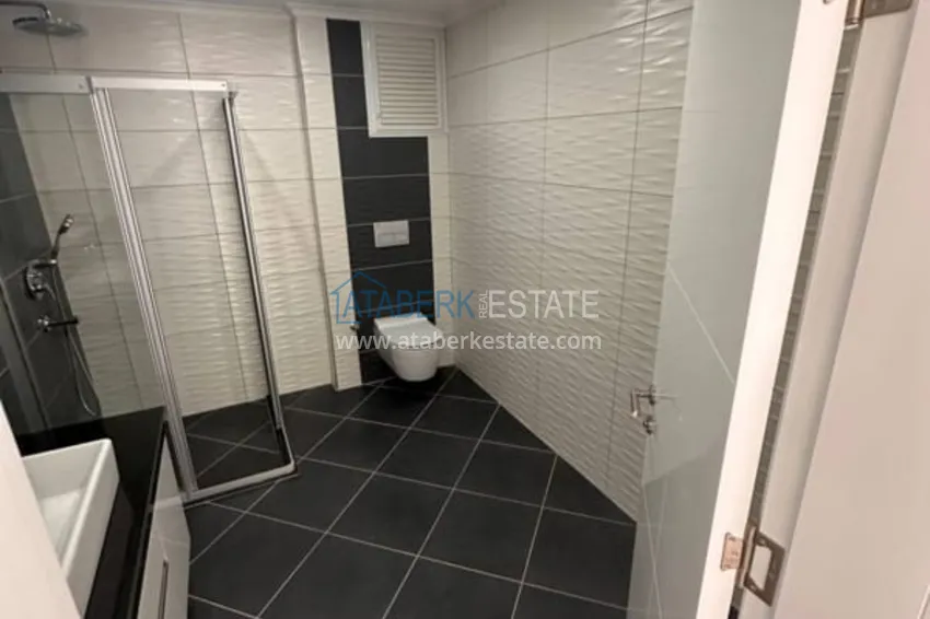 Приобрести Линейная квартира 4+1 в центре Алании с отдельной кухней, видом на море  27 