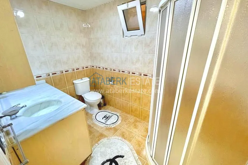 Приобрести Двухэтажные меблированные апартаменты с четырьмя спальнями в районе Оба 24 