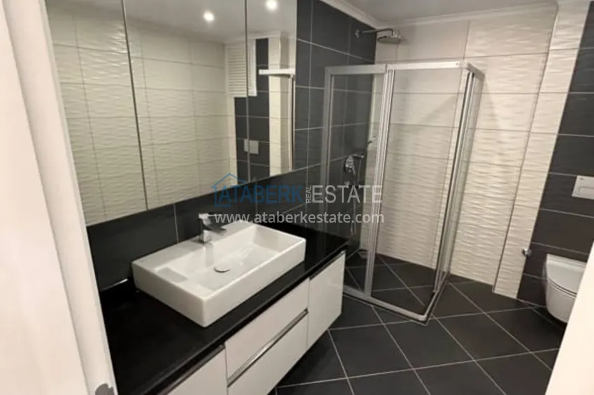 Приобрести Линейная квартира 4+1 в центре Алании с отдельной кухней, видом на море  28 