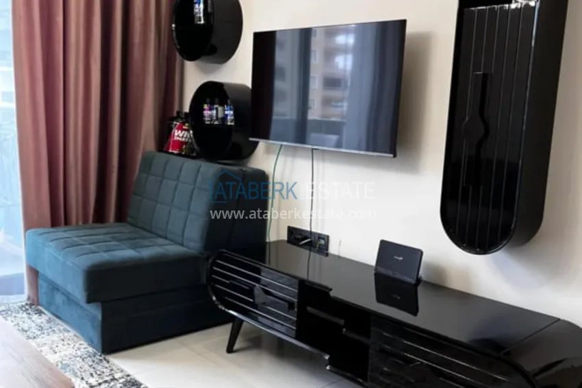 Приобрести Квартира 1+1 с мебелью в комплексе с инфраструктурой, район Махмутлар – Алания 3 