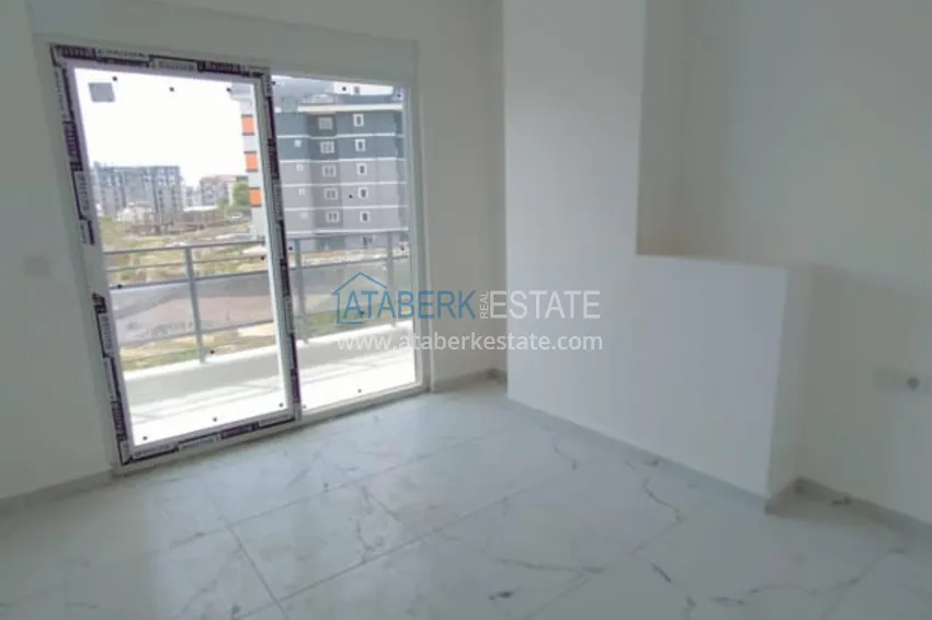 Приобрести Двухкомнатная квартира от собственника в новостройке Алания, район Авсаллар. Подходит для краткосрочной аренды 4 