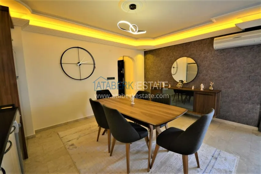 Приобрести Трехкомнатная квартира с мебелью в Махмутларе – район субботнего рынка 5 