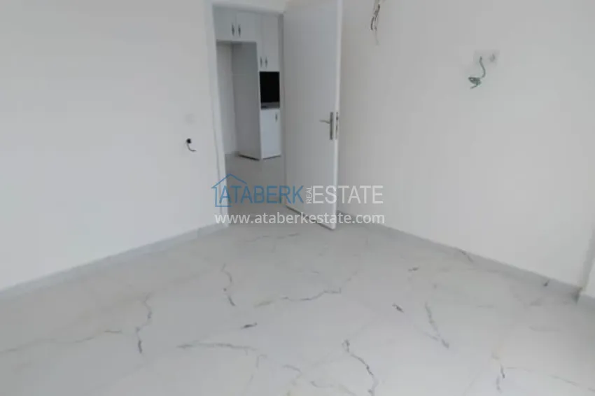 Приобрести Двухкомнатная квартира от собственника в новостройке Алания, район Авсаллар. Подходит для краткосрочной аренды 5 