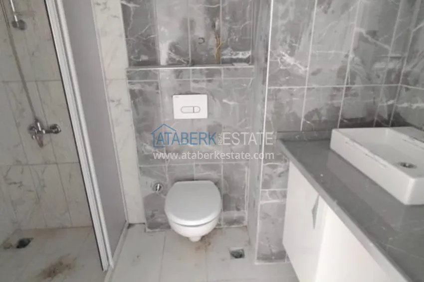 Приобрести Двухкомнатная квартира от собственника в новостройке Алания, район Авсаллар. Подходит для краткосрочной аренды 6 