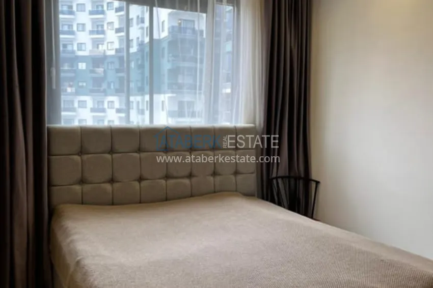 Приобрести Квартира 1+1 с мебелью в комплексе с инфраструктурой, район Махмутлар – Алания 7 