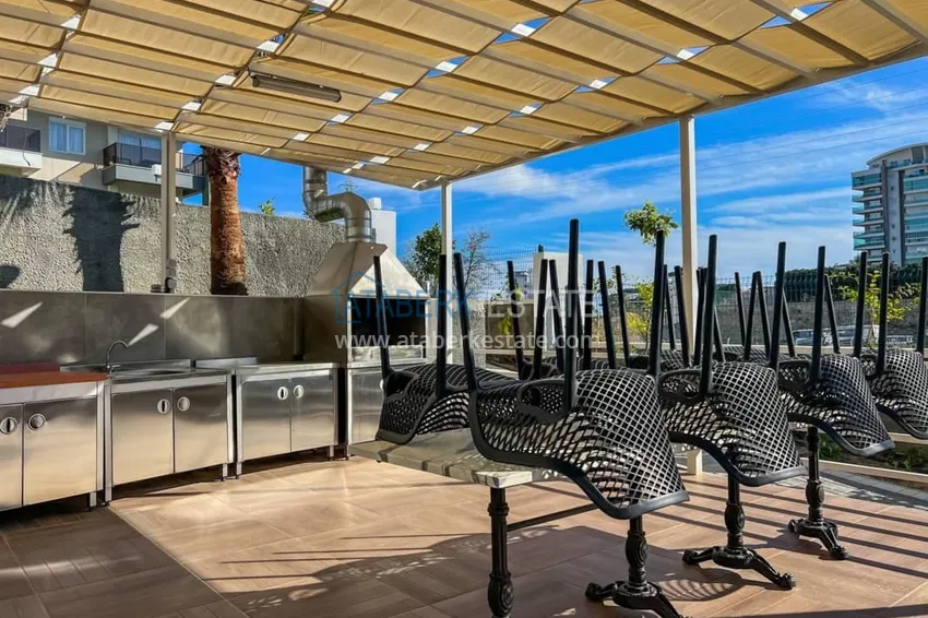 Квартира 1+1 меблированная в роскошной резиденции возле пляжа Инджекум, район Авсаллар – Алания 9 