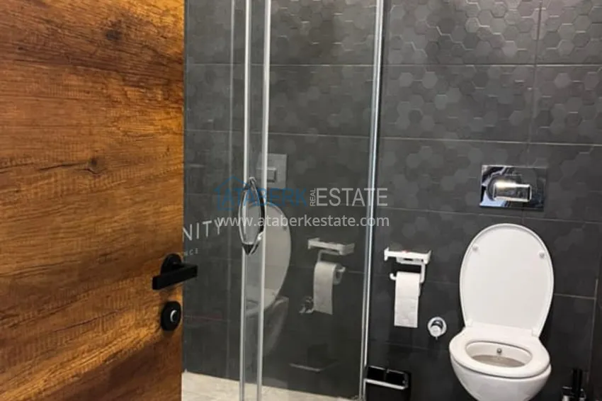 Приобрести Квартира 1+1 с мебелью в комплексе с инфраструктурой, район Махмутлар – Алания 9 