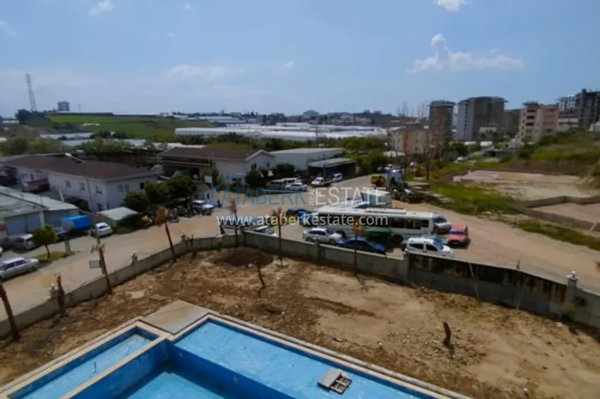 Приобрести Двухкомнатная квартира от собственника в новостройке Алания, район Авсаллар. Подходит для краткосрочной аренды 9 