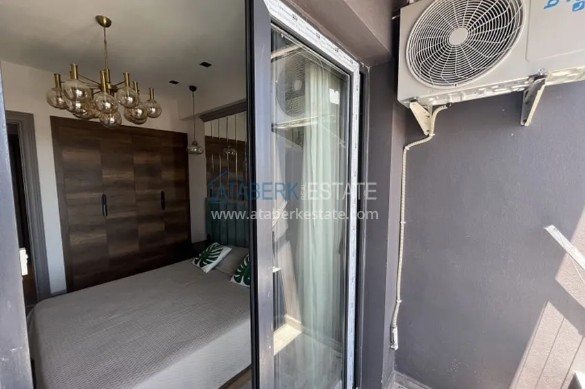 Приобрести Апартаменты 1+1 с мебелью и техникой, частично вид на море в районе Мезитли-Мерсин 29 