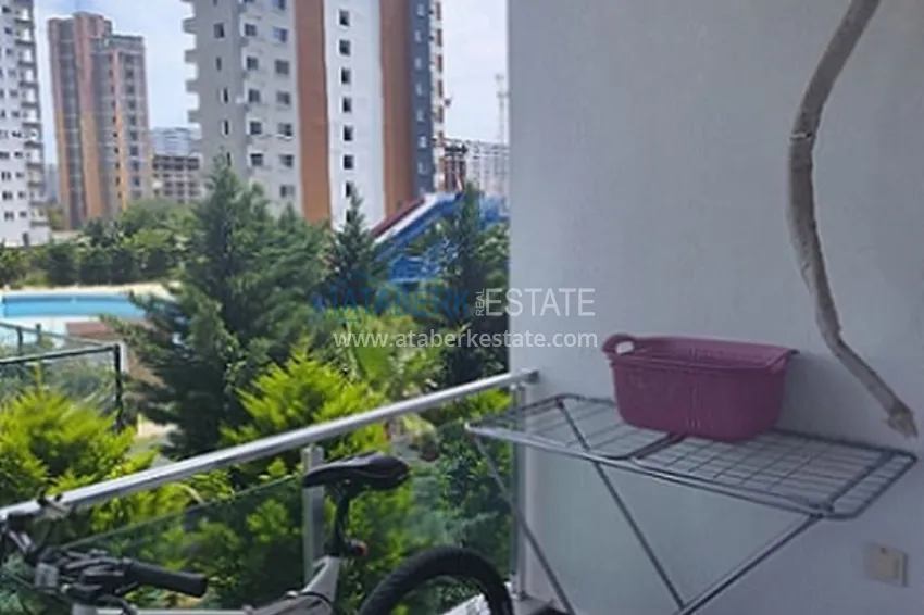 Приобрести Квартира 2+1 в жилом комплексе с инфраструктурой комфорт-класса в 100 метрах от Средиземного моря в районе Томюк-Мерсин 15 