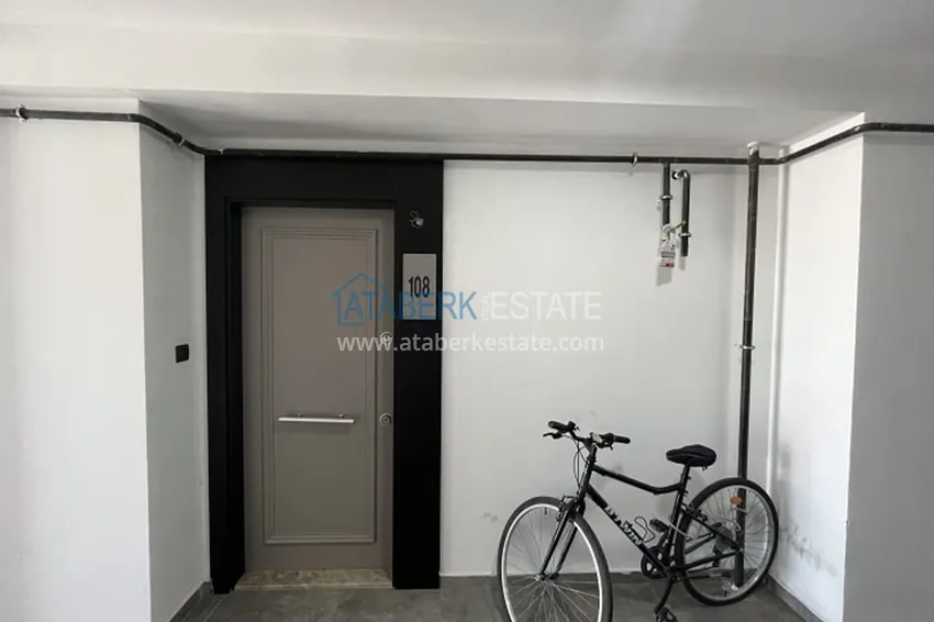 Апартаменты 1+1 с мебелью и техникой, частично вид на море в районе Мезитли-Мерсин 27 