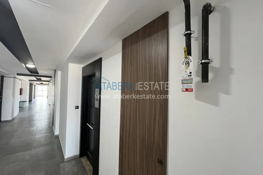 Апартаменты 1+1 с мебелью и техникой, частично вид на море в районе Мезитли-Мерсин 28 