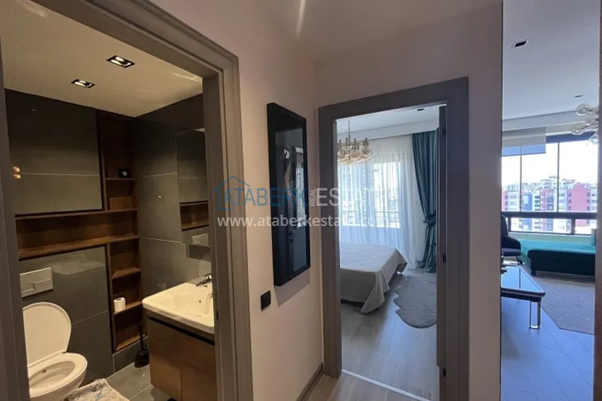 Приобрести Апартаменты 1+1 с мебелью и техникой, частично вид на море в районе Мезитли-Мерсин 22 