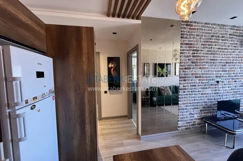 Приобрести Апартаменты 1+1 с мебелью и техникой, частично вид на море в районе Мезитли-Мерсин 23 