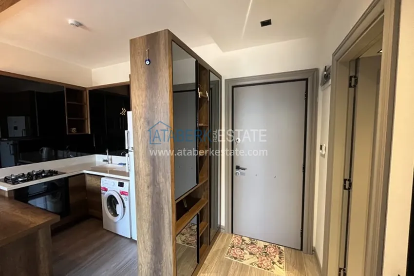 Приобрести Апартаменты 1+1 с мебелью и техникой, частично вид на море в районе Мезитли-Мерсин 24 