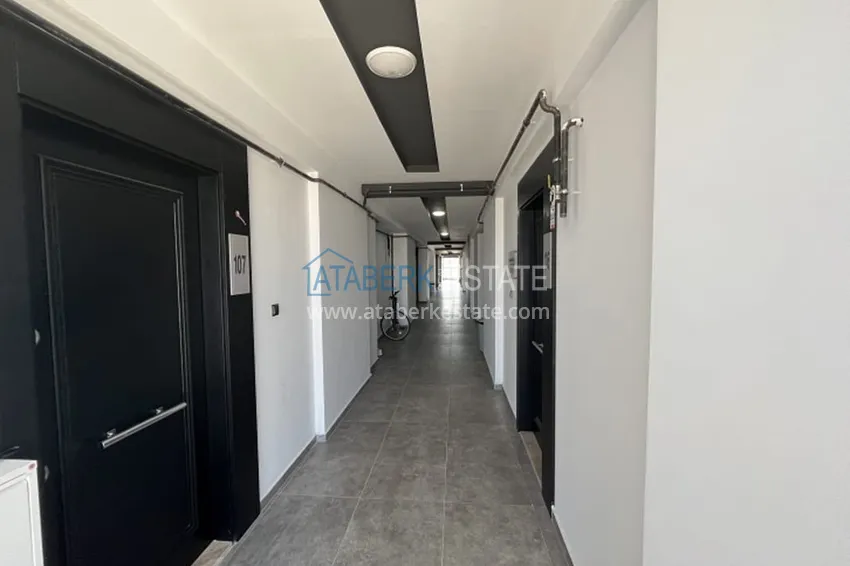 Апартаменты 1+1 с мебелью и техникой, частично вид на море в районе Мезитли-Мерсин 23 