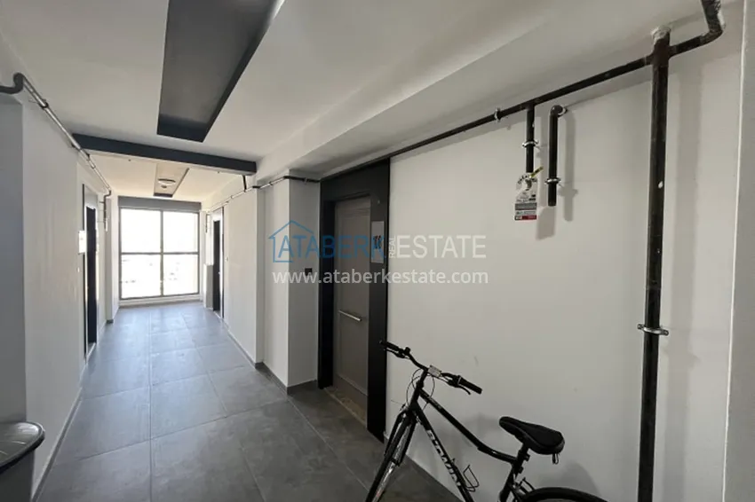 Апартаменты 1+1 с мебелью и техникой, частично вид на море в районе Мезитли-Мерсин 25 