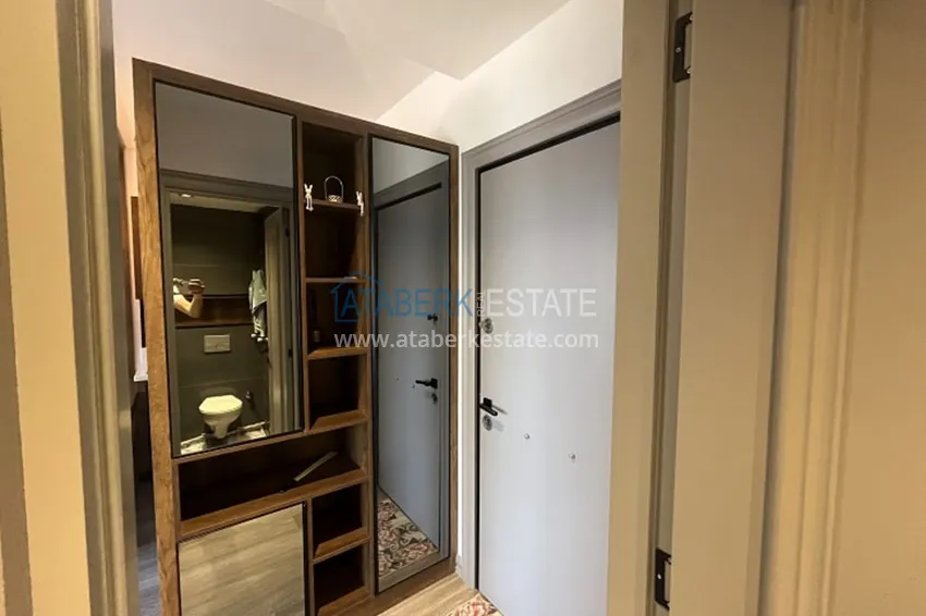 Приобрести Апартаменты 1+1 с мебелью и техникой, частично вид на море в районе Мезитли-Мерсин 25 