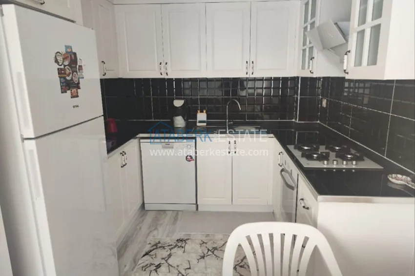 Приобрести Квартира 2+1 в жилом комплексе с инфраструктурой комфорт-класса в 100 метрах от Средиземного моря в районе Томюк-Мерсин 5 