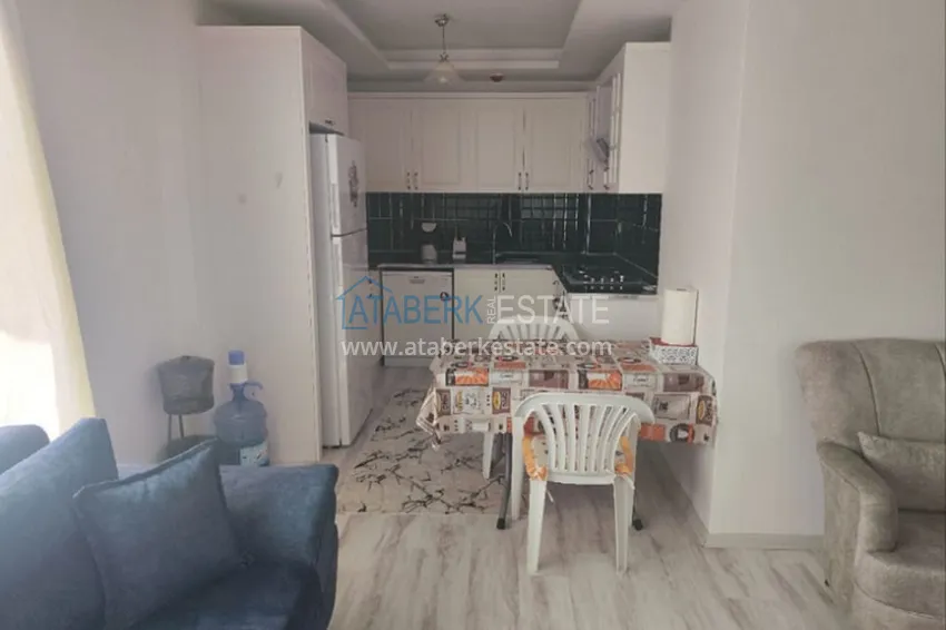 Приобрести Квартира 2+1 в жилом комплексе с инфраструктурой комфорт-класса в 100 метрах от Средиземного моря в районе Томюк-Мерсин 6 